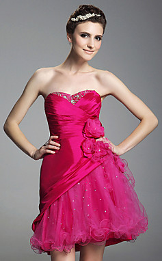 فساتين قصيره للسهرات 2013 2014 oaqlwy1283506990728.jpg