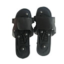 La terapia de masaje zapatilla